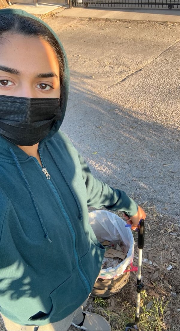 A photo of the Austin skyline with the buildings colored a beautiful pinkish hue from the sunset. It is connected to a blog about 7 reasons to pickup trash in Austin, Texas.